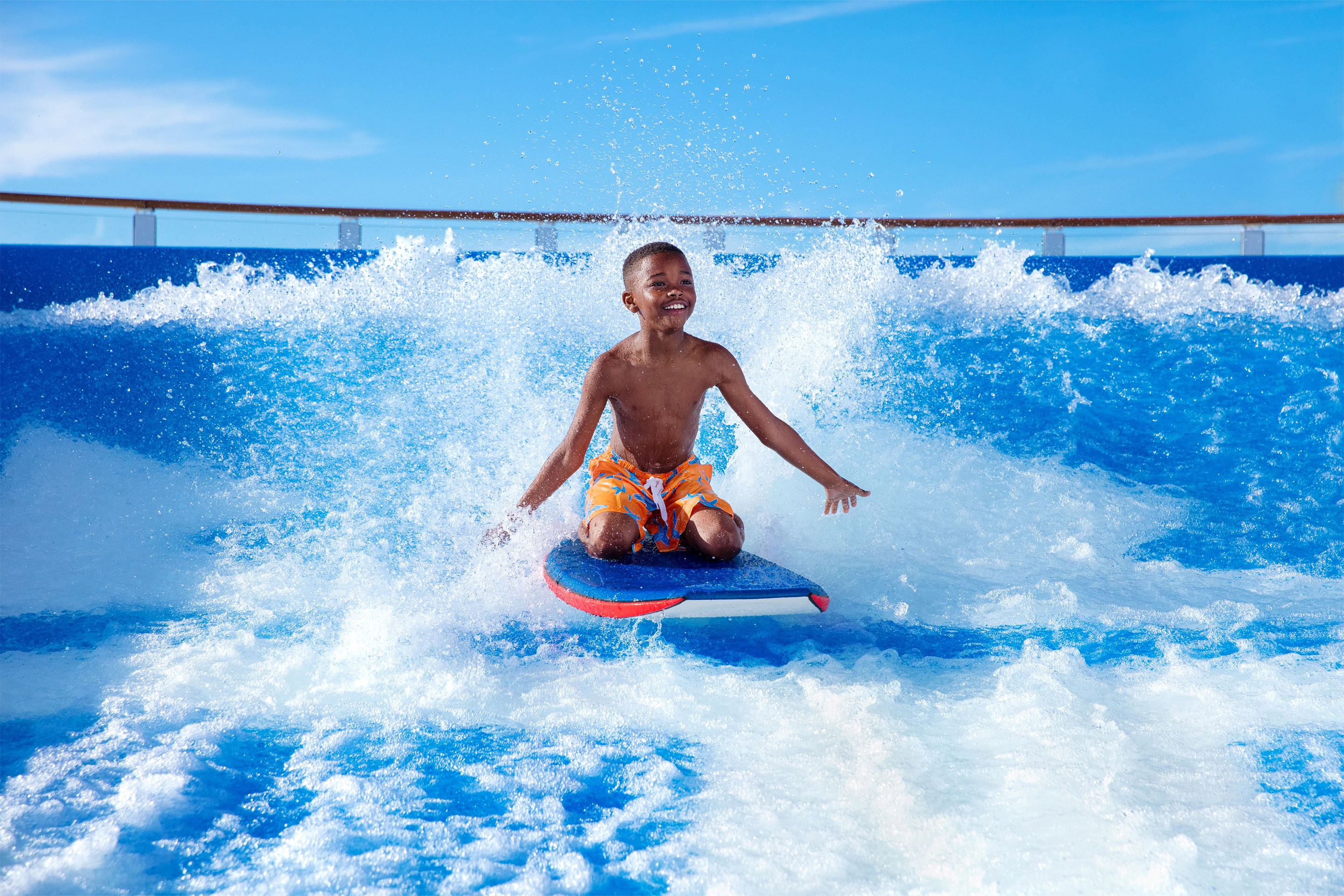 Boy on Flowrider on the boggie board