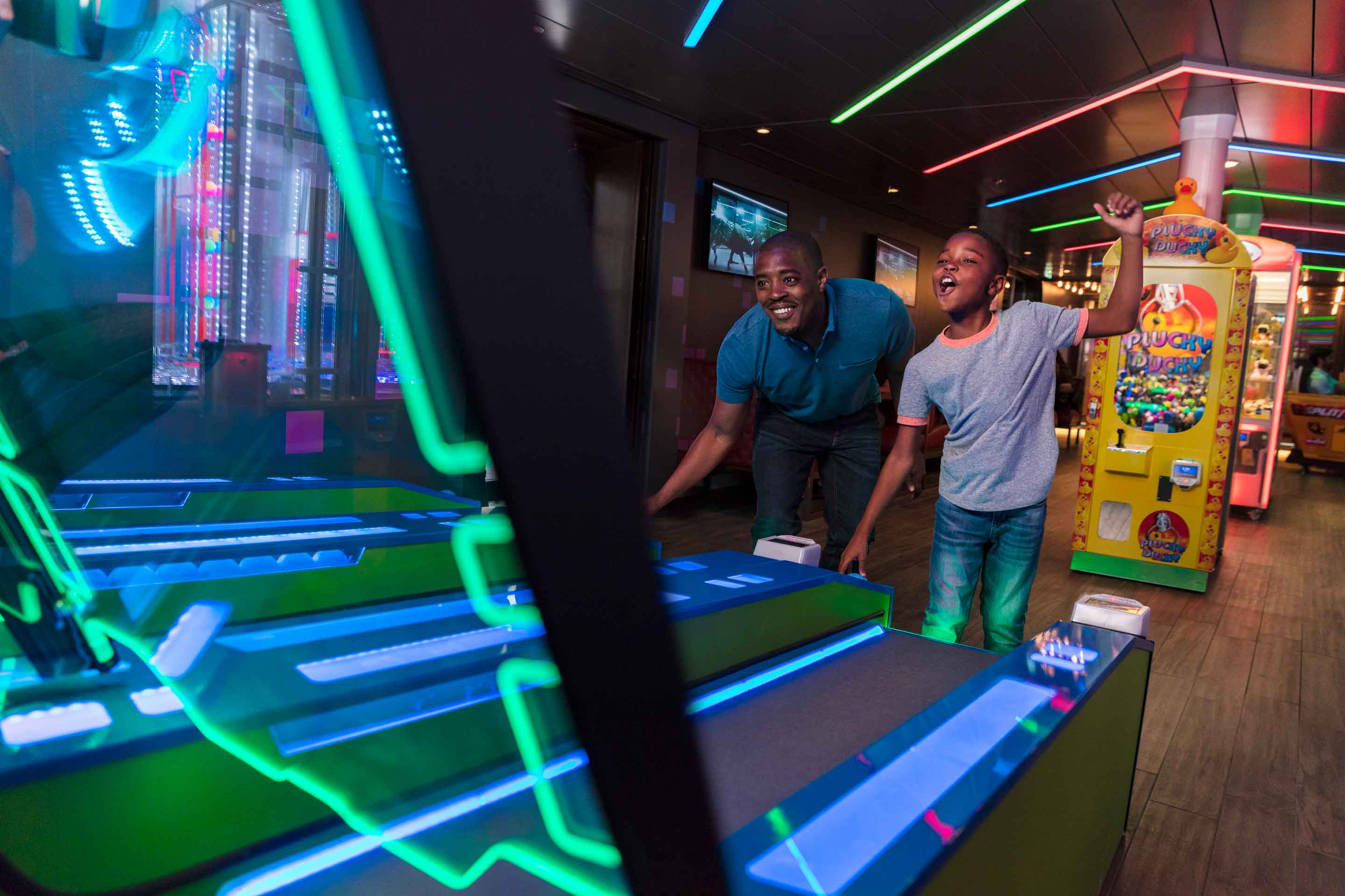 Playing skeeball at Playmaker's Sports Bar & Arcade